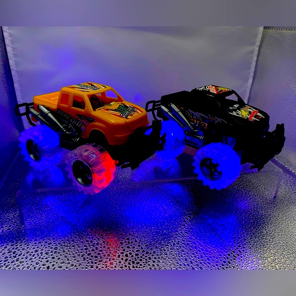 LED Light Up “Monster Trucks” Push & Go Quantity: 2 trucks